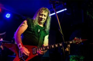 "Lips" Kudlow of Anvil on stage. Image by Mick Burgess.